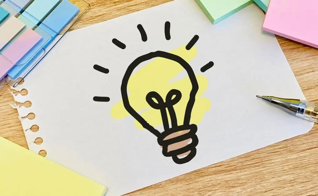 紙に描かれた電球のイラスト