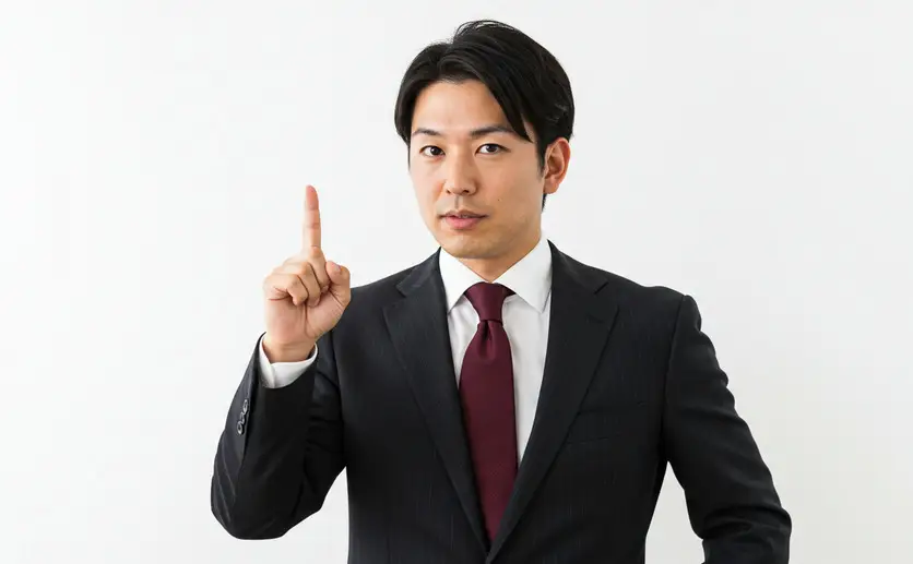 ポイントを指し示す男性