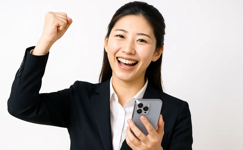資産運用に成功して喜ぶ女性